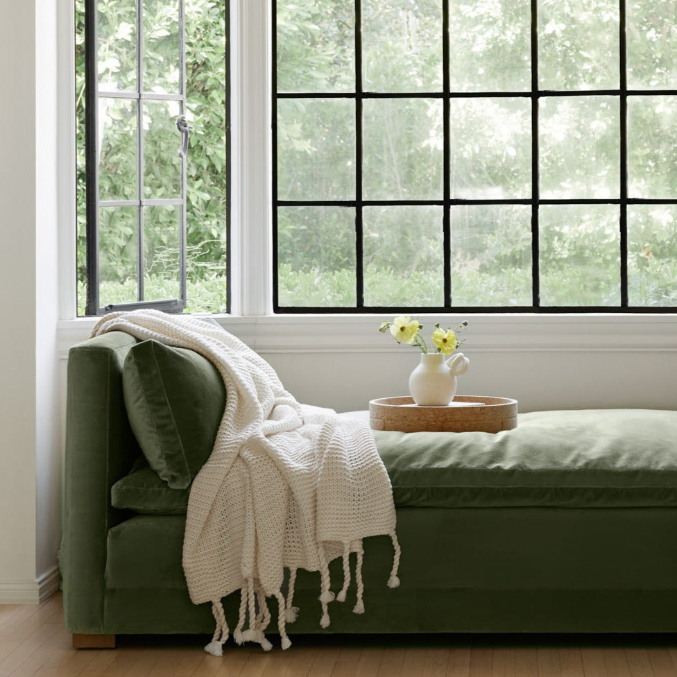 Couverture douillette avec tissage texturé épais et houppes