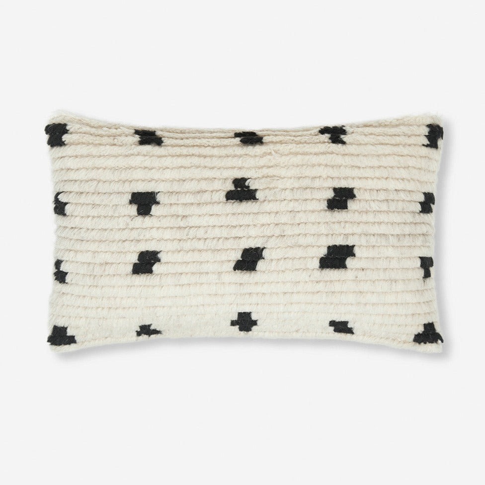 Coussin à motifs de points irréguliers