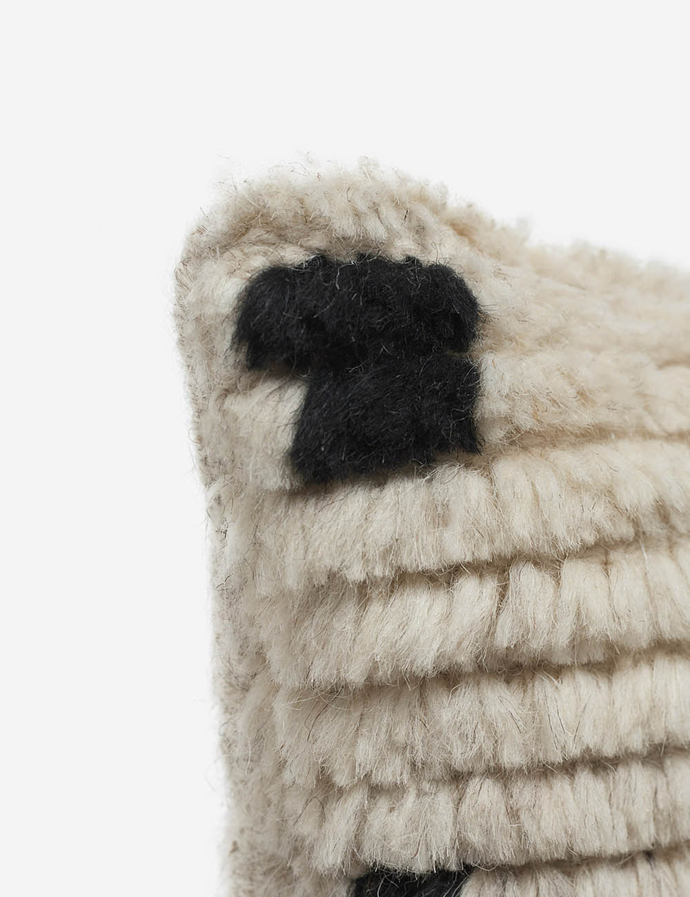 Coussin à motifs de points irréguliers