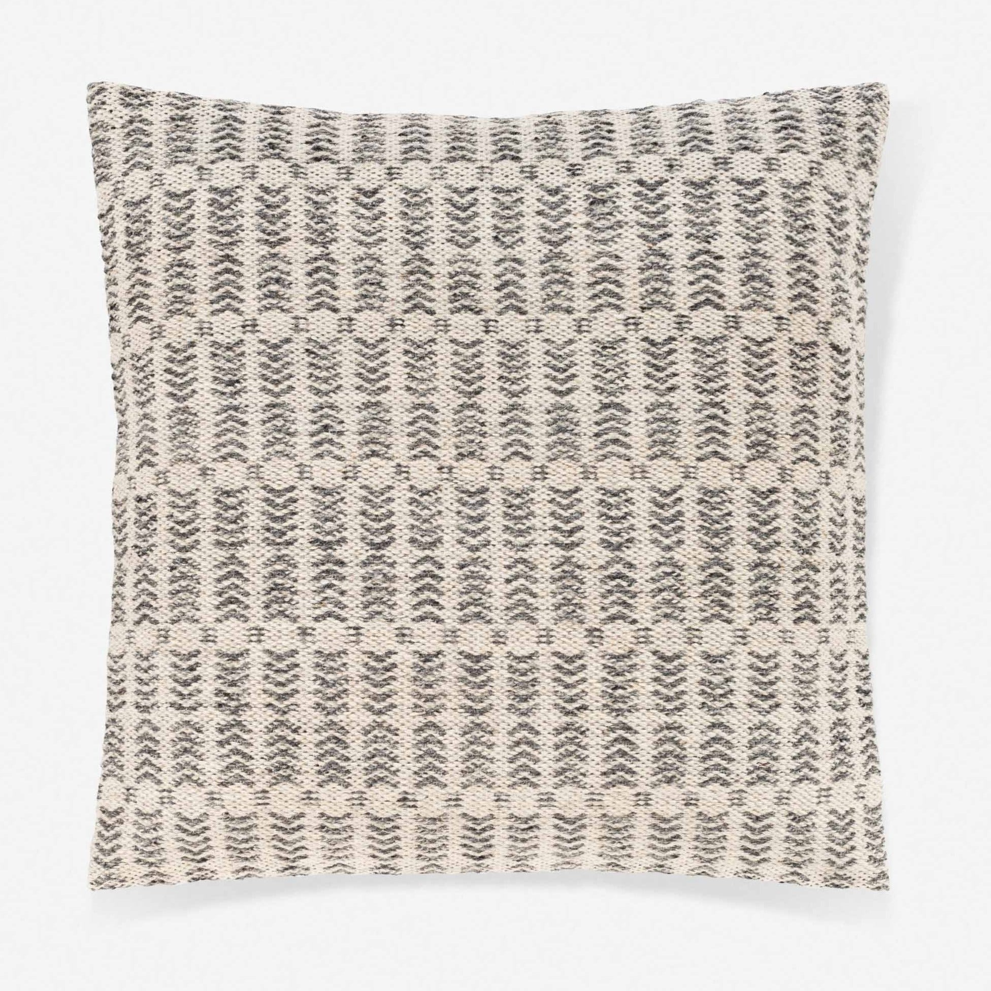 Coussin tissé avec motif géométrique