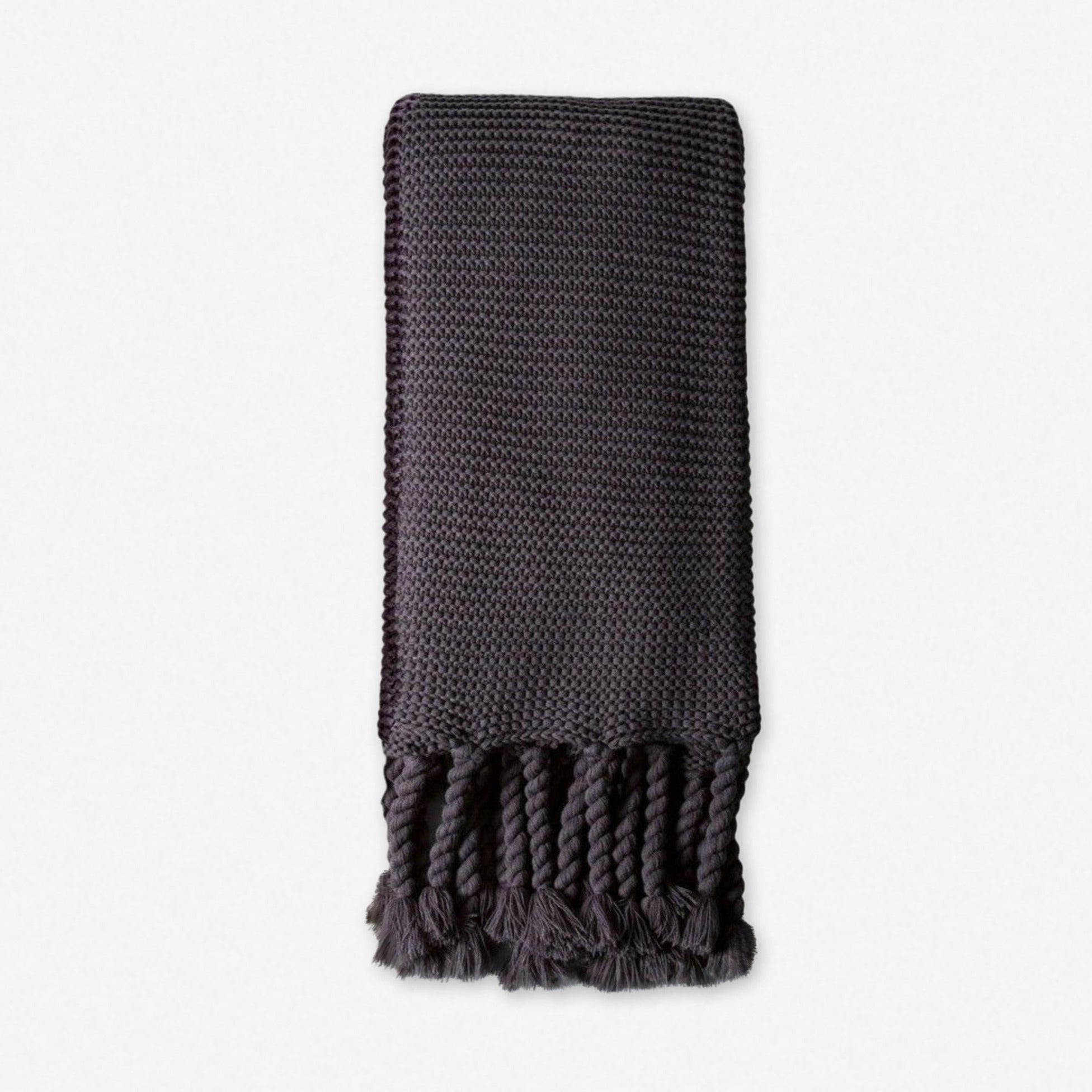 Couverture douillette avec tissage texturé épais et houppes