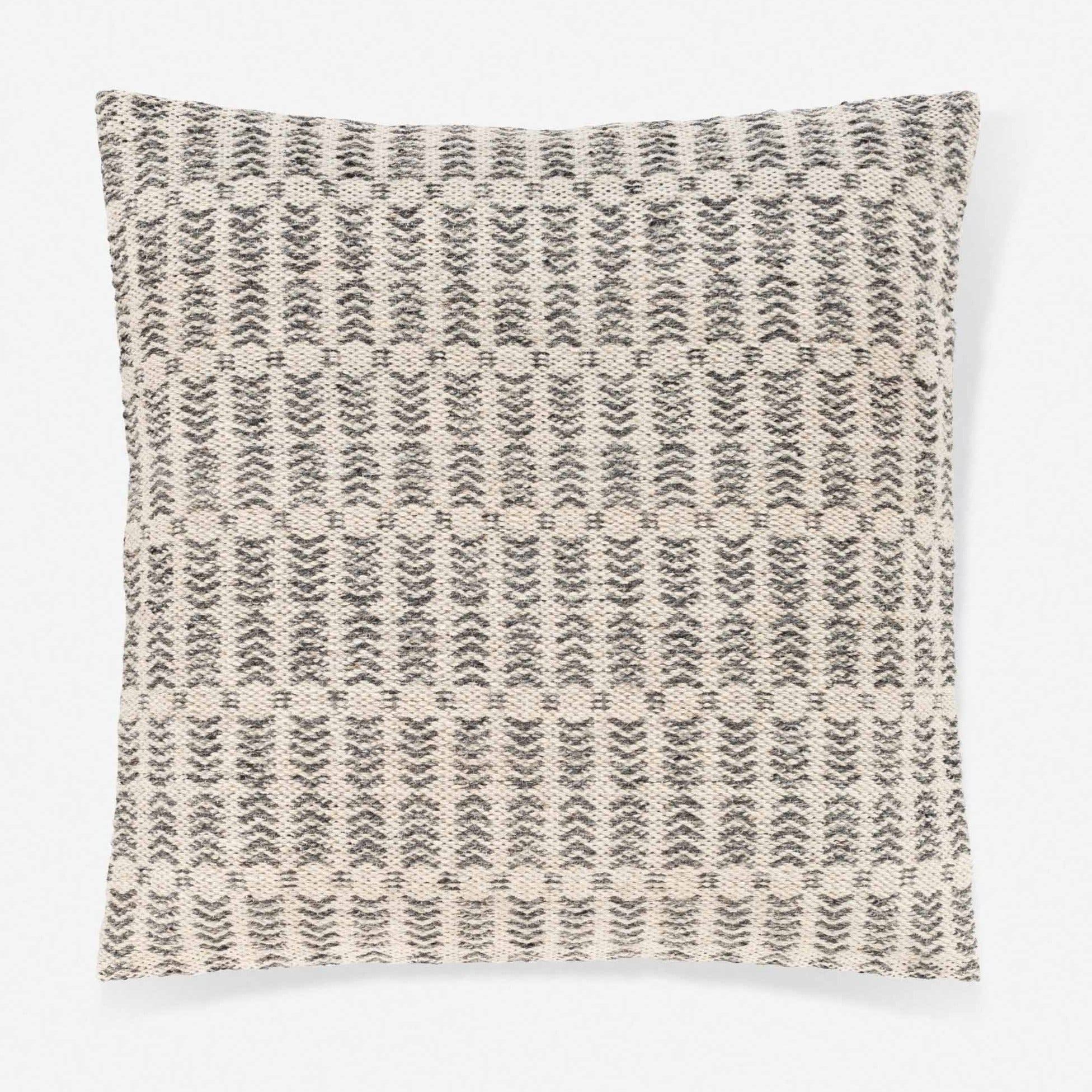 Coussin tissé avec motif géométrique